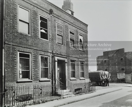 East Lane, Bermondsey, No.89. Derelict house with an army van on the right 1947.  X.png