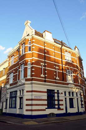 Surrey Square, The Surrey Arms Pub, corner with Madron Street right, now residential. c2011.   X.png