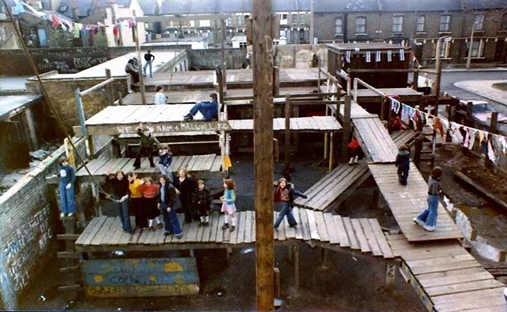 Blendon Row, c1980, behind you can just see the 2 prefabs and houses in Eltham street awaiting demolition. X.png