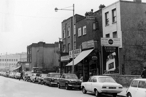 The Cut, c1969. Looking towards Lower Marsh, Windmill pub is set back on the left of Cookes pie and mash.    X.png