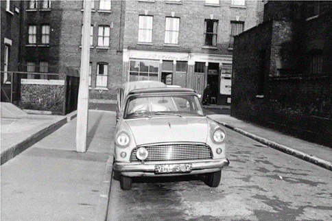 Paragon Row, c.1962 looking into Balfour Street. Sam’s the barbers behind.   X.png