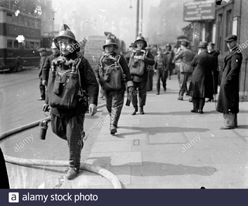 Bricklayers Arms Railway fire 1936. Fireman wearing breathing apparatus.   X.png