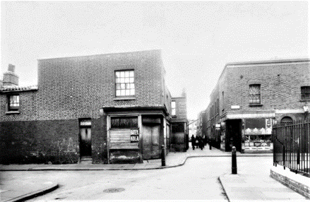 Kinglake Street,1937. You are looking towards the Old Kent Road; Eagle Place is to the left and Brook Cottages to the right. The Two Eagles pub is jutting out in the gap. X.png