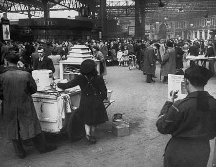 Waterloo Road, 1947. Crowds of people waiting for trains at Waterloo Station.  X..png