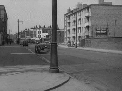 Film The Ringer 1952. Jamaica Road, Southwark, looking towards Southwark Park Road, from the corner of Prospect Street, Pynfolds Estate on the right.  Pic 2.  X.png