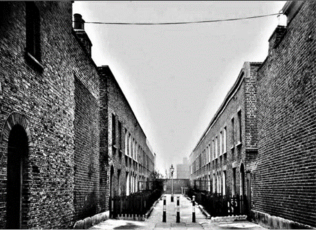 Brockley Terrace off Alvey Street, c1956. This is looking down the terrace towards the wall over which was the back playground of Surrey Square School.   X..png