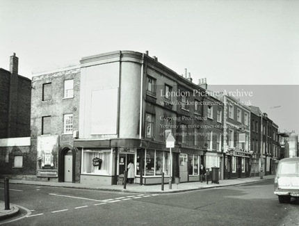 Bermondsey Street, left is Morocco Street, Bermondsey. The Woolpack Public House further along the road, poster on flank wall for 'Always Use the Green Cross Code'.  X..png