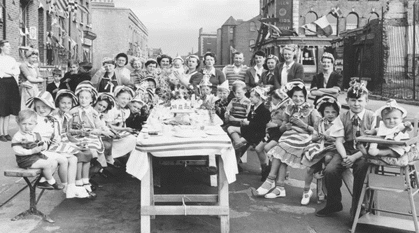 Thurlow Street, Coronation party 1953. Hour Glass pub is in the background right.   X..png