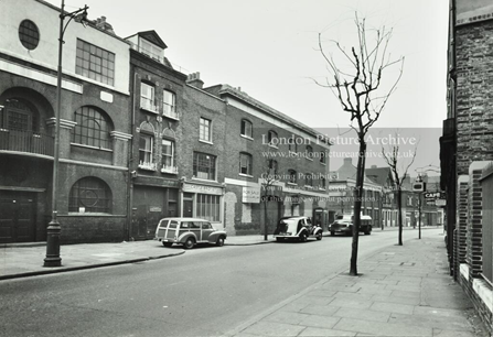 Long Lane, c1957. Castle Brothers Limited left. In the distance, on the left is the mock Tudor facade of The Ship public house.   X..png