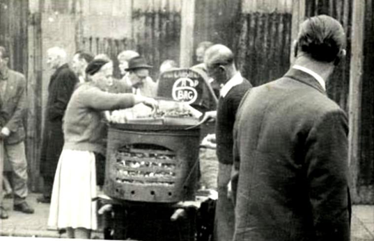 East Lane, hot chestnut vendors c1960. Flo &  Len.  X..png