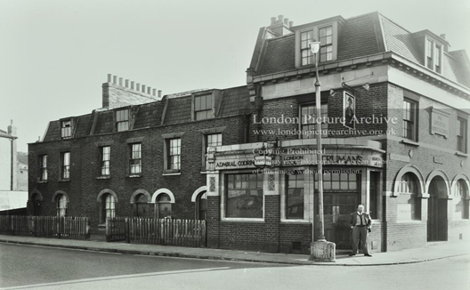 New Church Road, Southwark, c1955. Admiral Codrington Pub, corner with Lomond Grove (right).   X..png