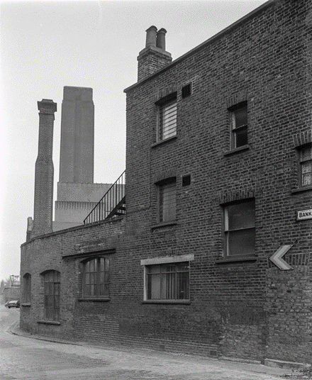 Bankside, Hopton Street behind c1991, this building was a paper merchant. In the background Bankside Power Station, now the Tate Modern.  X..png