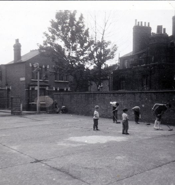 Elsted Street c1968, the 'Square' at Edward Clifford House, a bit of a communal clean up going on.  X..png