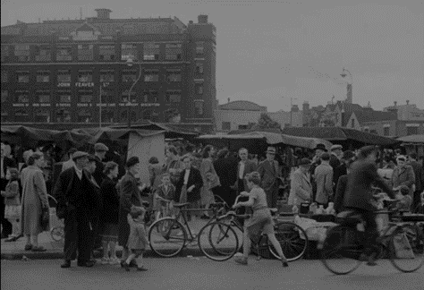 Tower Bridge Road, Bermondsey Street Market c1953. John Feavers in the background.  X..png