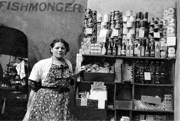 East Street,1938, Jean Godfrey next to her father’s grocery shop, adjacent to no. 25 East Street..png