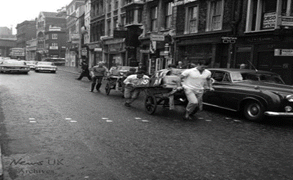 2 Borough Market Workers Fruit Barrow Race, 1966.   Borough High Street, looking towards London Bridge.    X..png
