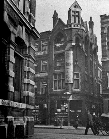 Borough High Street, The Old Tabard Pub, with Talbot Yard right, the pub was built in 1873. 1 X.png