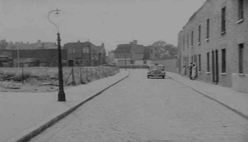 Skid Kids (Children’s Film Foundation) 1953. Stanworth Street with The Grange crossing in the distance. 2 X..png