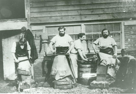 Abbey Street, workers working leather and animal hides at the Neckinger Leather Mills, c1862.  X..png