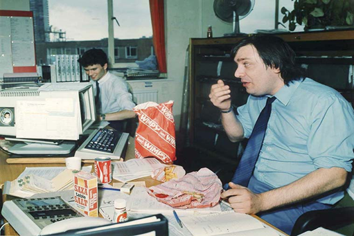 Bermondsey Trading Estate, Southwark, 1987.  Employees eating lunch at Horne Paper Ltd.   X..png