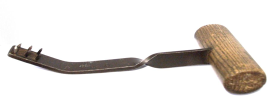 Butlers Wharf, Engraved T.W. (owner's initials) and 50 is stamped on the iron. Used at Butlers (Grinders and Operators) Limited, 11 Shad Thames, SE1, c1880. X..png