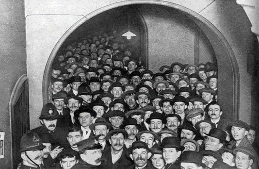 WW1. London recruits crowded into the corridors of Southwark Town Hall in December 1915, X..png