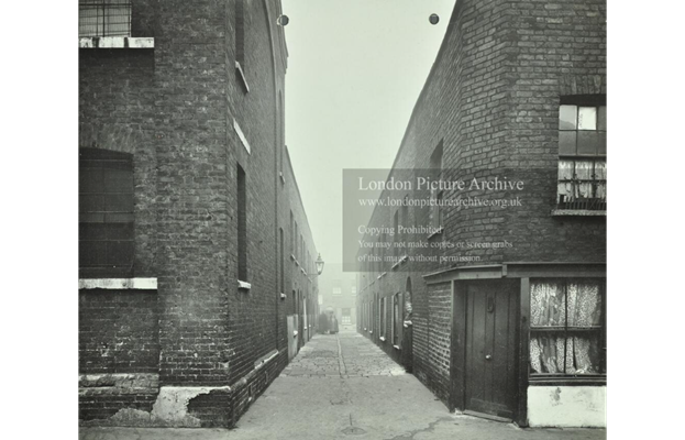 Stannage, from Delph Street, Southwark, showing terraced buildings c1913.  The buildings on the left are the back of a Sunday School.  X..png