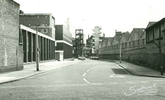 Great Suffolk Street, looking down Pocock Street, 1977, Southwark Bridge Road Fire Station Drill Towers far end.  X..png
