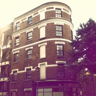Mill Street left c2013, Parkers Row right. Tower Bridge Buildings.   X.png