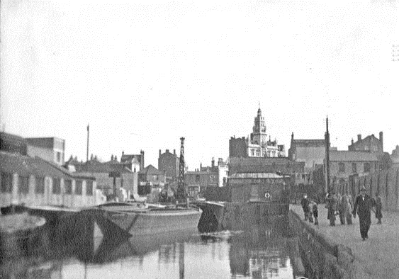 2   Grand Surrey Canal, with Jones & Higgins Peckham in background.   X..png