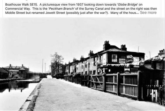 Grand Surrey Canal, Boathouse Walk 1937 looking down to Globe Bridge on Commercial Way. Middle Street right renamed Jowett Street. X.png