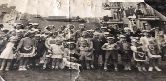 East Street (Lane), Coronation Day 1952, taken outside Manchester House.  1 X..png