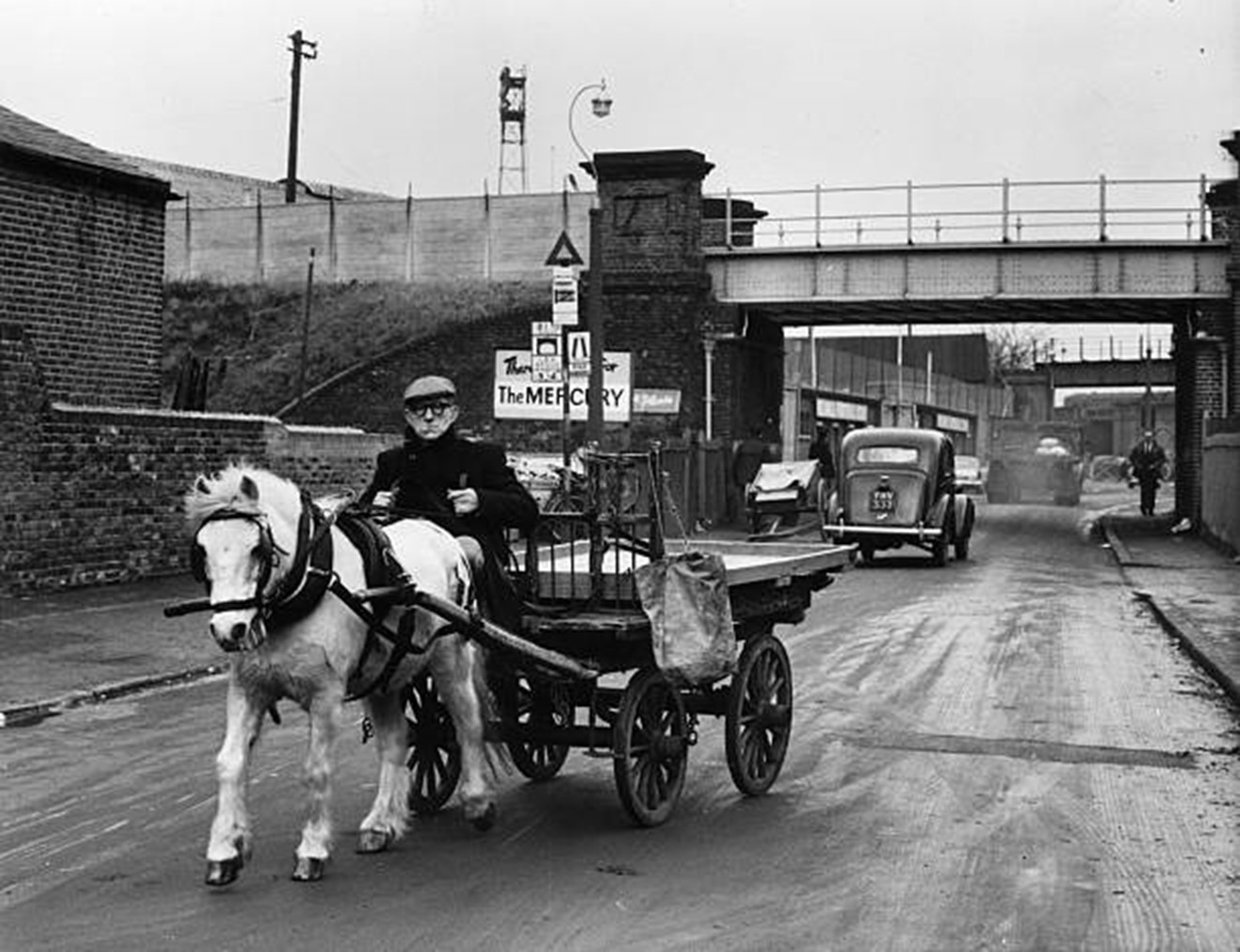 Millwall, Cold Blow Lane entrance. Rag and bone man Frank Gironella with his pony Titch.  X..jpg