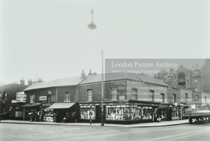 New Church Road and Southampton Way left, in the background is a partial side elevation of Evelina Mansions..1 X png.png