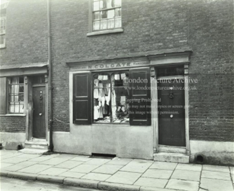 Artillery Street, Bermondsey, N. Colgate haberdashers’ shop. St John's Housing Estate now stands on the site. c1938.. 2 X. png.png