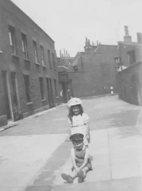 Rock Grove c1952, Christine Dodsworth & Alan Taylor outside no.17.   1  X.jpg