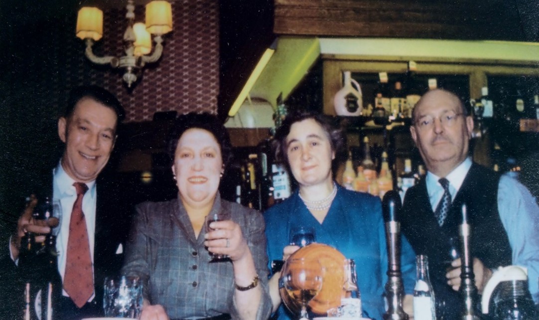 16.  Tower Bridge Road corner Tanner Street, Bermondsey, The Raven & Sun Pub, c1960. The Landlord is on the far right and was the licensee for over 40 years.   X..jpg