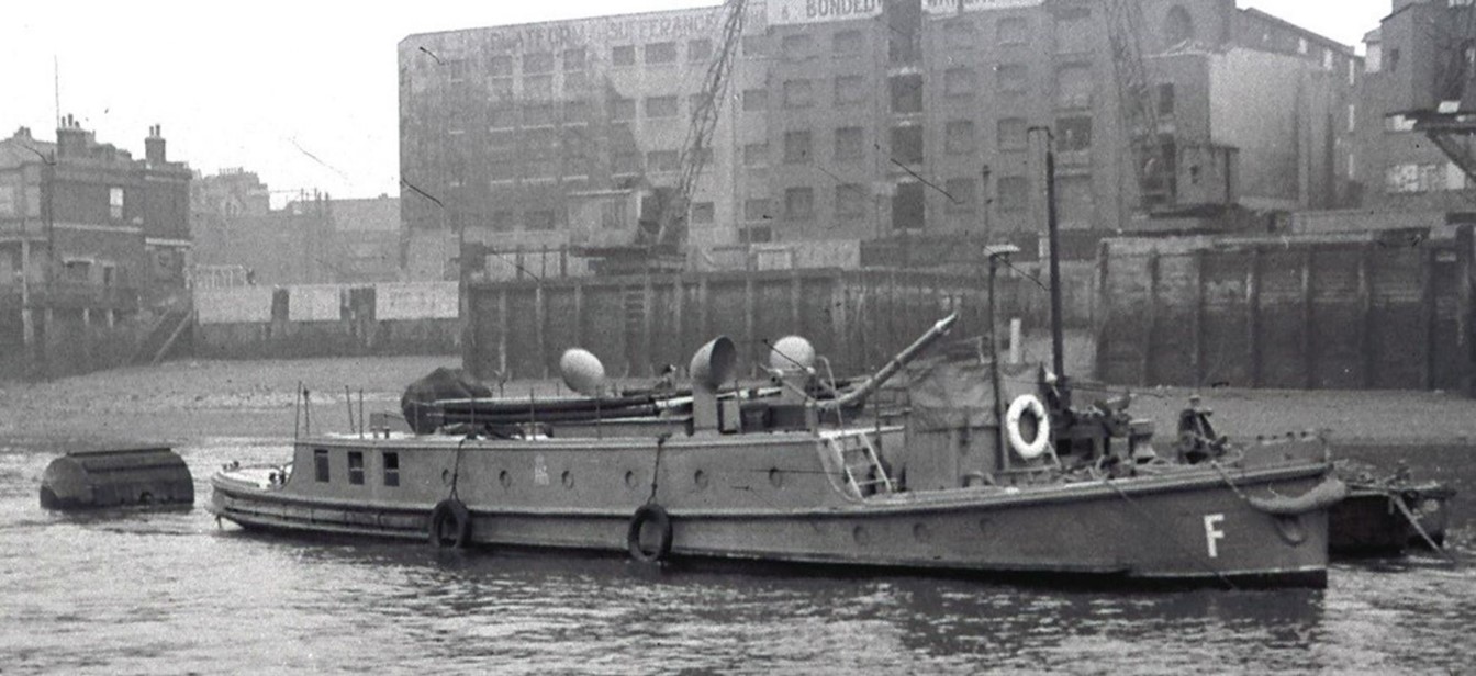 Cherry Garden Pier, The Beta III on the river at Rotherhithe moored close to fire station RZ4, Auxiliary Fire Service (AFS) c1940. Angel Pub far left.   X..jpg