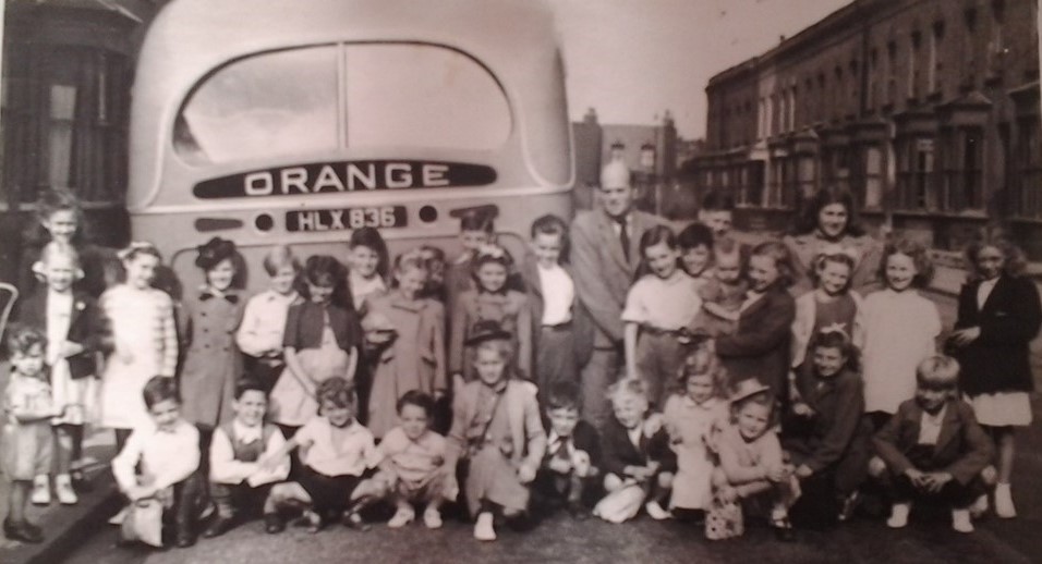 Bartholomew Road (Street)., Bermondsey, 3 from the left is Maureen Fisher, George Littee is on the left of the man, 1948-49, on our way to Margate.  1. X..jpg