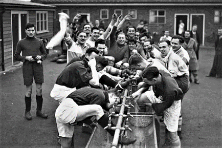 Hackney Marshes,1938. Remember doing this in the 1950s-60s. Breaking the ice to wash, it was bloody cold..png