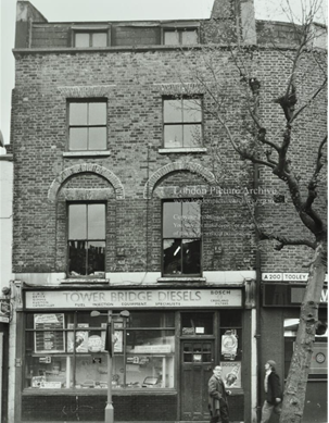 Tooley Street, Tower Bridge Diesel, fuel injection equipment specialists and car parts, c1976.    X..png