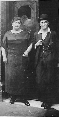Wilson Grove, formally Salisbury Street, Eliza Tillson nee Bennett, proprietor of the Three Compasses Pub with her son George Ernest Tillson 1922, outside the pub.  1.  X..png