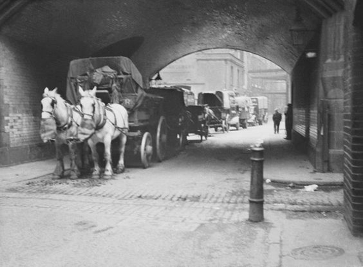 Tower Bridge, underneath the arches c1900.  X..png
