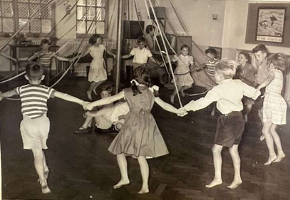 Southwark Park  Road, children enjoying may pole dancing. No Date.  X..png