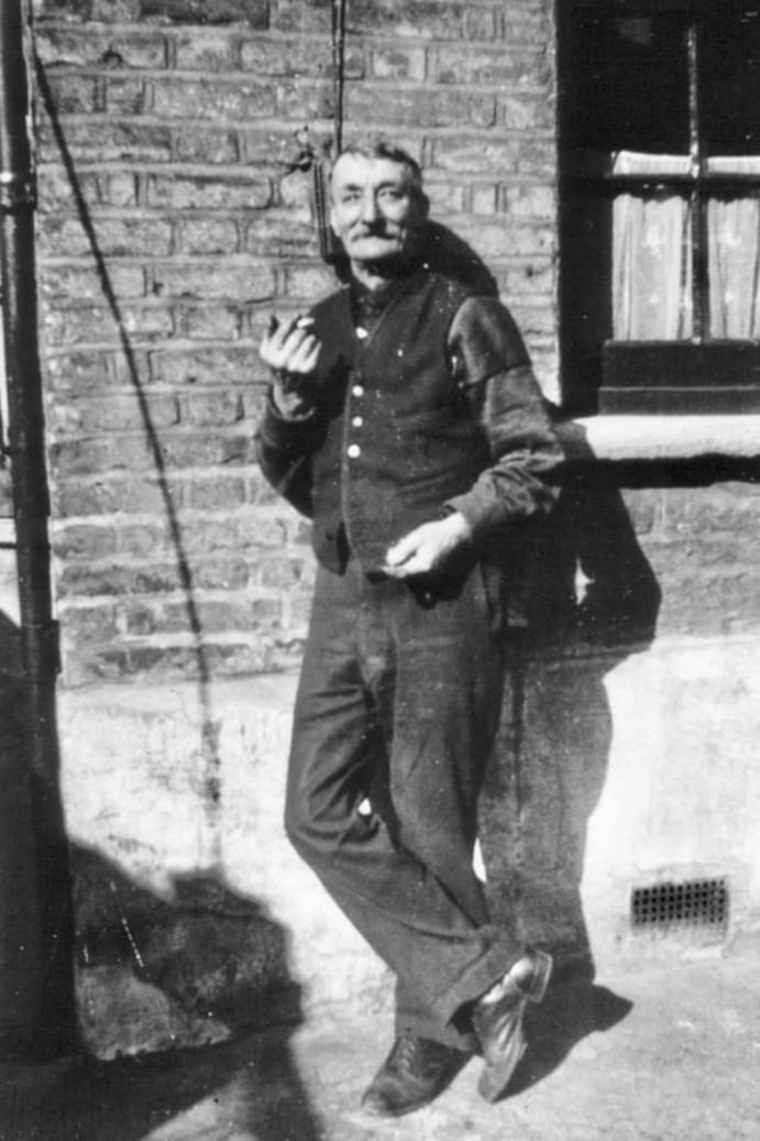 Barkworth Road, William Alfred H Newton outside his home, Mr Newton was sawyer at Peek Frean.  X.jpg