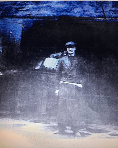 Alexis Street, Bertram Hawkins outside his  Grocers Shop..png