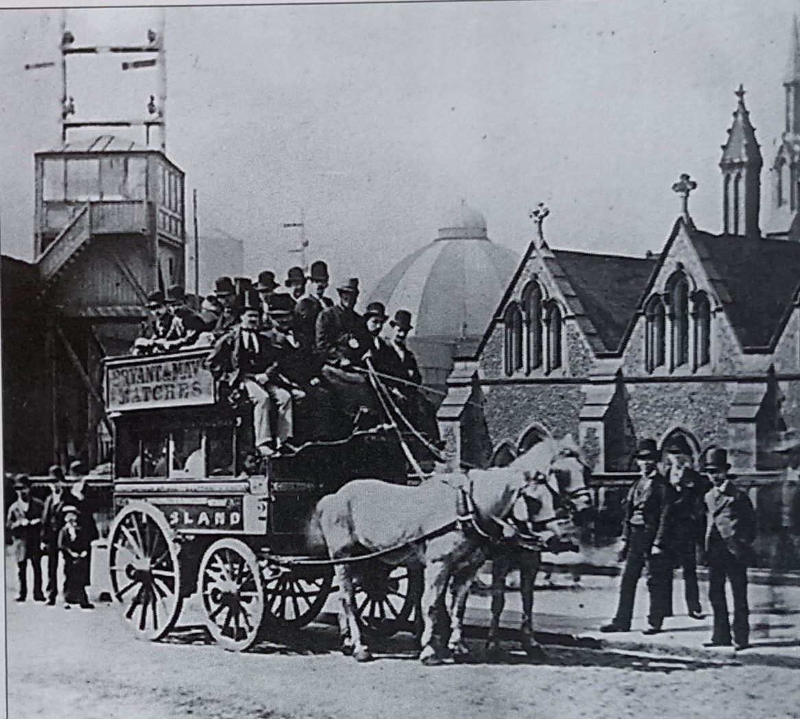Borough High Street, the church is St. Saviour's Church, now Southwark Cathedral. The dome is the Borough Market, c1890..jpg