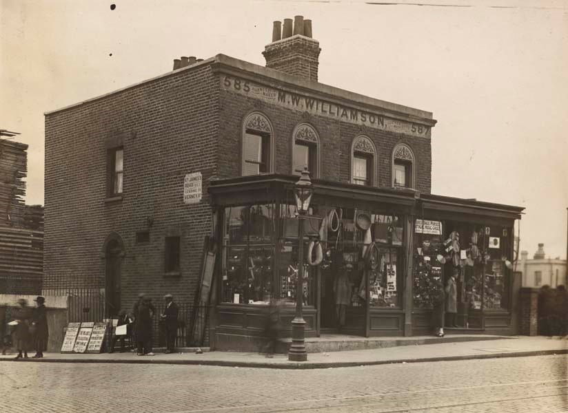 M. W. Williamson, harness maker and leather merchant, on Canal bridge, Surrey Canal. (585 & 589 Old Kent Road bridge).jpg