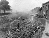 Man clearing drained Grand Surrey Canal,Old Kent Road..jpg