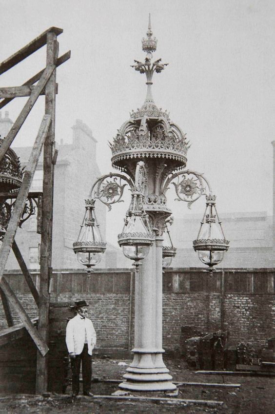 Photograph of the cast iron lamp and manufacturer Walter Macfarlane, prior to its installation in Southwark Street, c1865. junction with Borough High Street.jpg